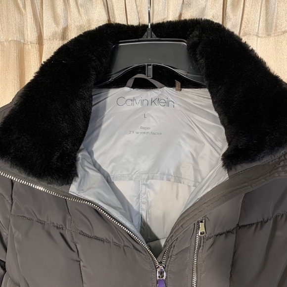 Calvin Klein Puffer jacket. Size Large. Color Gray with black faux fur. - Picture 7 of 13
